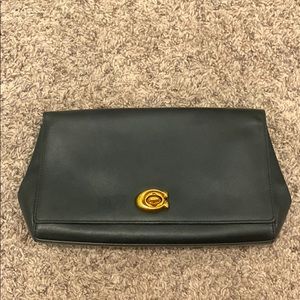 Coach clutch with attachable gold chain